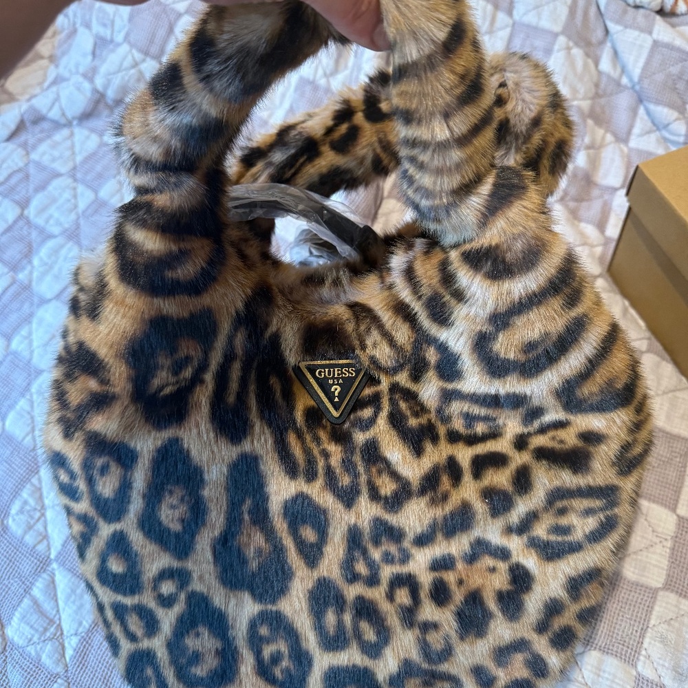 Never used Guess Faux Fur Leopord Print Purse!